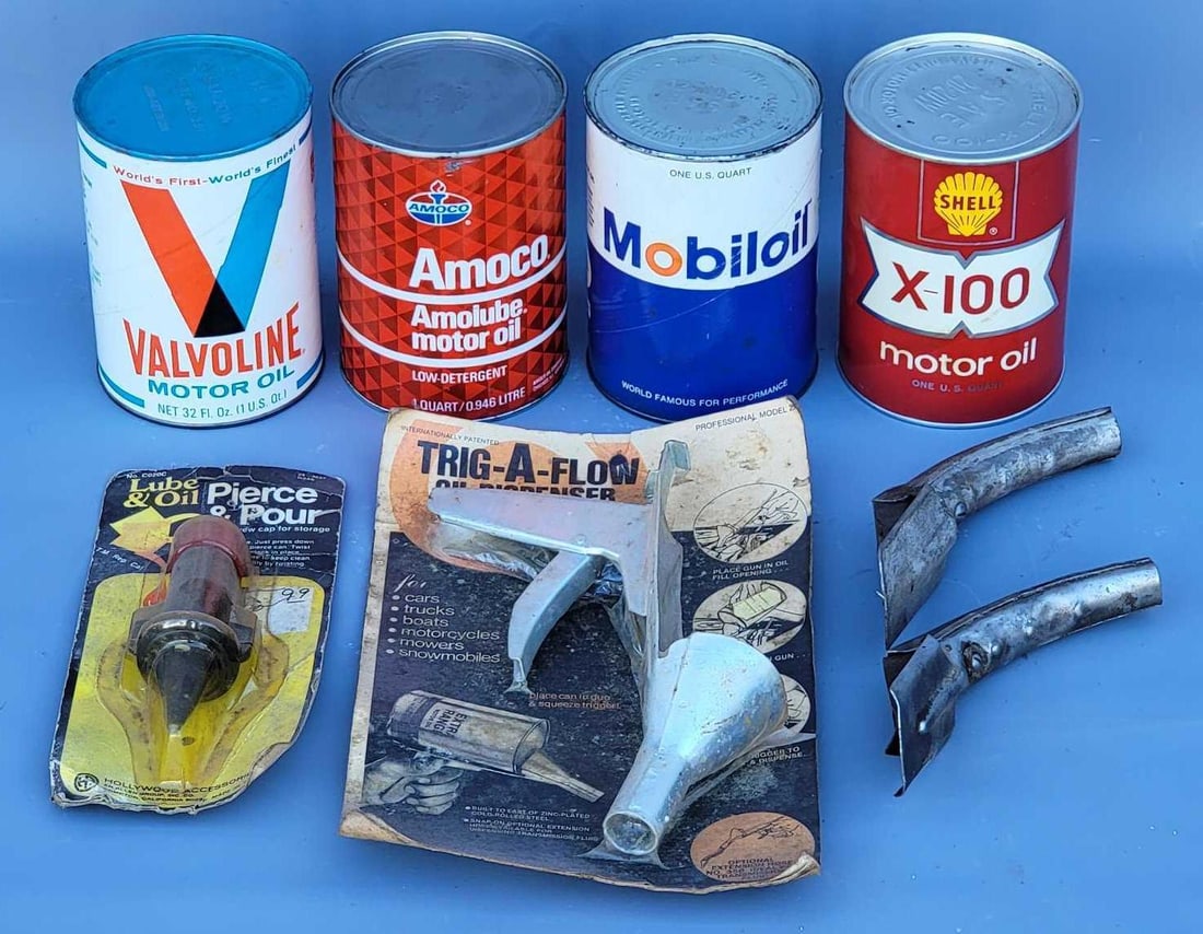 Four full cardboard oil cans plus four spouts (1 of 9)