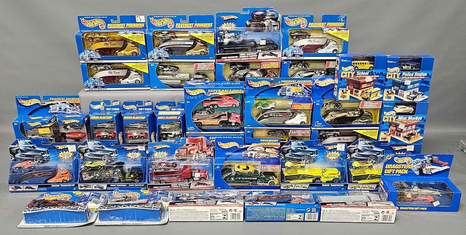 Huge group of modern era Hot Wheels with Pavement Pounders and more: Huge group of modern era Hot Wheels with Pavement Pounders and more. You get everything that you see in the pics, 39 separate packaged items with some duplicates. Some packages are near mint while oth