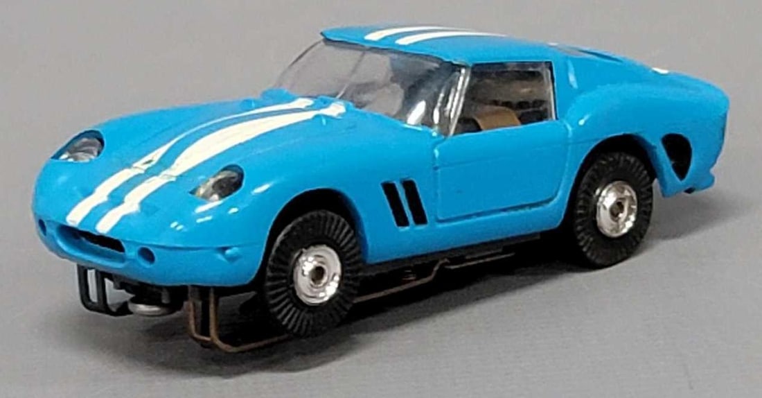 Aurora T jet 1493 blue Ferrari Flamethrower HO slot car: Aurora T jet 1493 Ferrari Flamethrower HO slot car with lighted chassis in very good to excellent condition as seen in the photos. Has been tested and ran slightly with working lights.