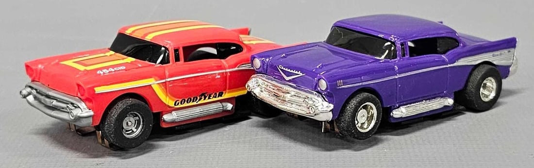 Two Tyco Chevy Bel Air HO slot cars: Two Tyco Chevy Bel Air HO slot cars to include one purple and one pro stock in red, these are in excellent to near mint condition as seen in the photos. Both have been tested and run perfectly.