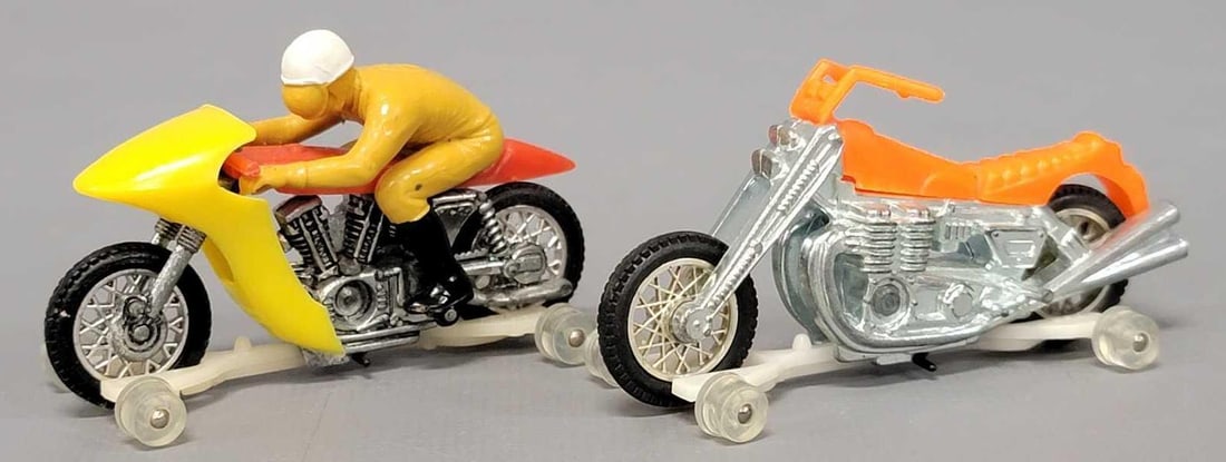 Two Mattel Rrrumblers: Two Mattel Rrrumblers to include an orange Road Hog and a red seat with yellow fairing rip snorter with a tan 6 rider, both bikes are in excellent condition as seen in the photos.