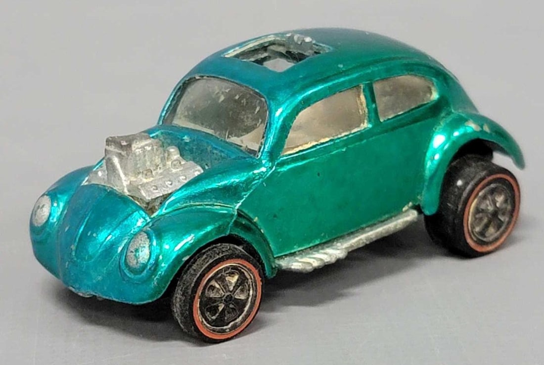 Two tone green and aqua Redline Hot Wheels Custom Volkswagen: Two tone green and aqua Redline Hot Wheels Custom Volkswagen, the drivers side if green and the passengers side is aqua with a half and half mix around the middle of the roof. A super addition to any