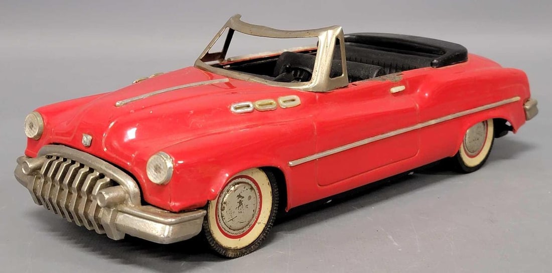 Voiture tin friction Buick convertible: Voiture tin friction Buick convertible is in very good condition, car is missing chrome on driver side at the top of the door, missing windshield glass, and the friction works as it should as seen in 