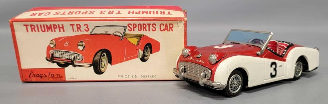 Cragstan Triumph TR3 friction Japan tin car in original box: Cragstan Triumph TR3 friction Japan tin car in original box, car is in excellent plus condition, has a few scratches and small dent in the trunk area, and comes in a very good original box as seen in 
