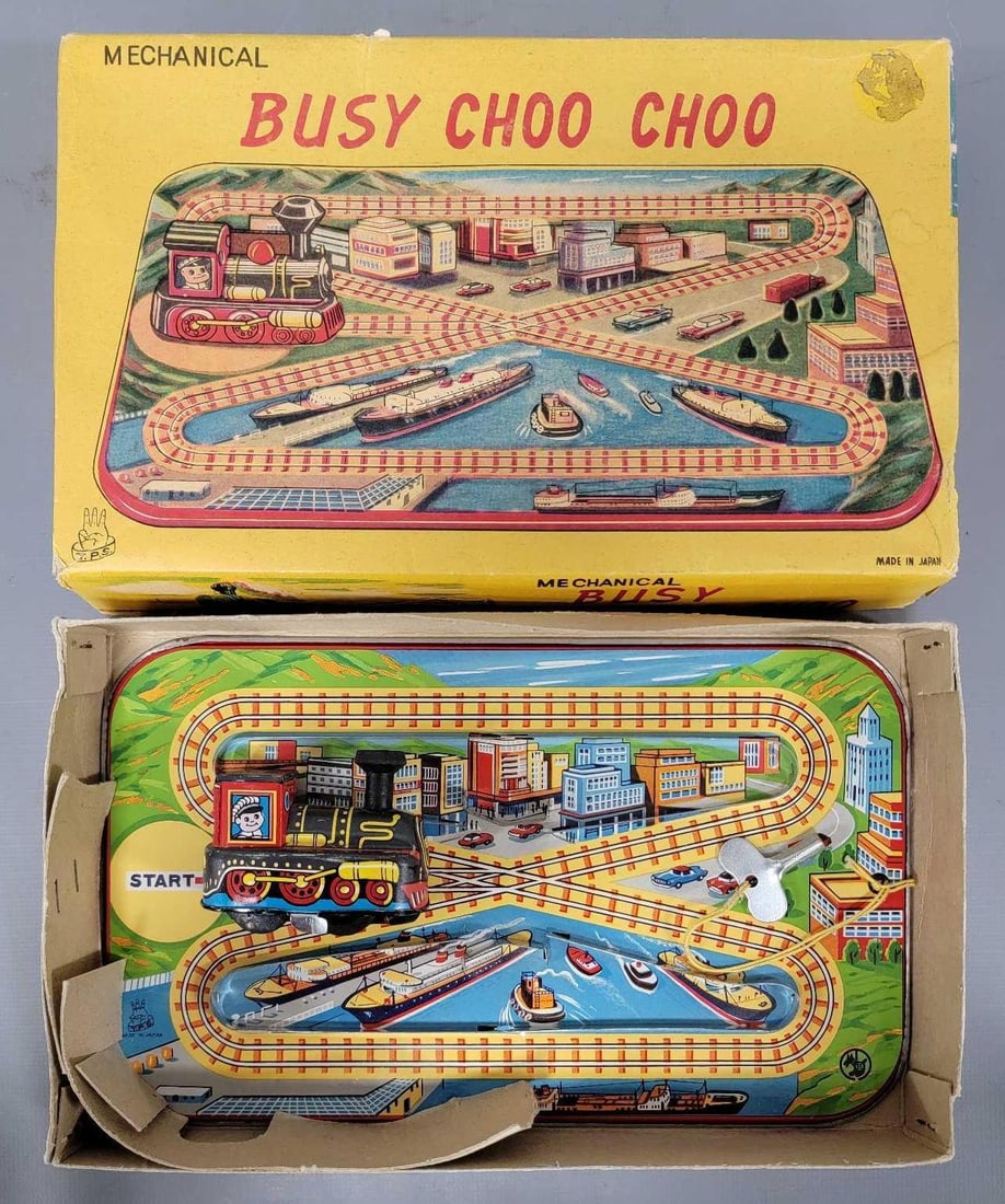 TPS Japan tin lithographed Mechanical Busy Choo Choo in original box: TPS Japan tin lithographed Mechanical Busy Choo Choo in original box, excellent plus to near mint condition in a very good plus original box as seen in the photos.