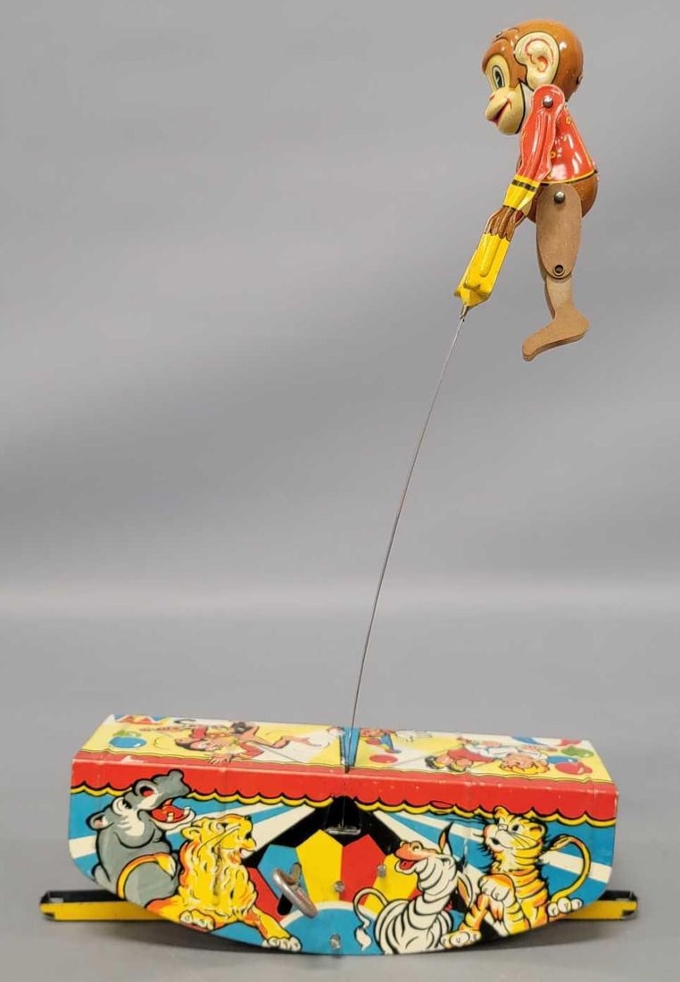 Marx Acrobatic Marvel tin lithographed monkey toy: Marx Acrobatic Marvel tin lithographed monkey toy in excellent working condition as seen in the photos.