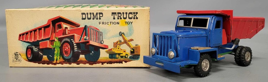 High grade Shioji SSS International Japan tin friction dump truck in original box: High grade Shioji SSS International Japan tin friction dump truck in original box, near mint condition in an excellent plus original box as seen in the photos. Measures 8 1/2 inches long.