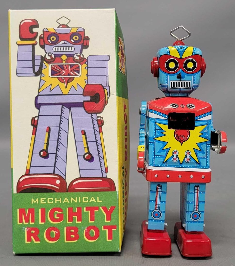 Robot Island modern tin lithographed Mechanical Mighty Robot in original box: Robot Island modern tin lithographed Mechanical Mighty Robot in original box in excellent to near mint working condition in a near mint original box as seen in the photos. Stands 7 3/4 inches tall.
