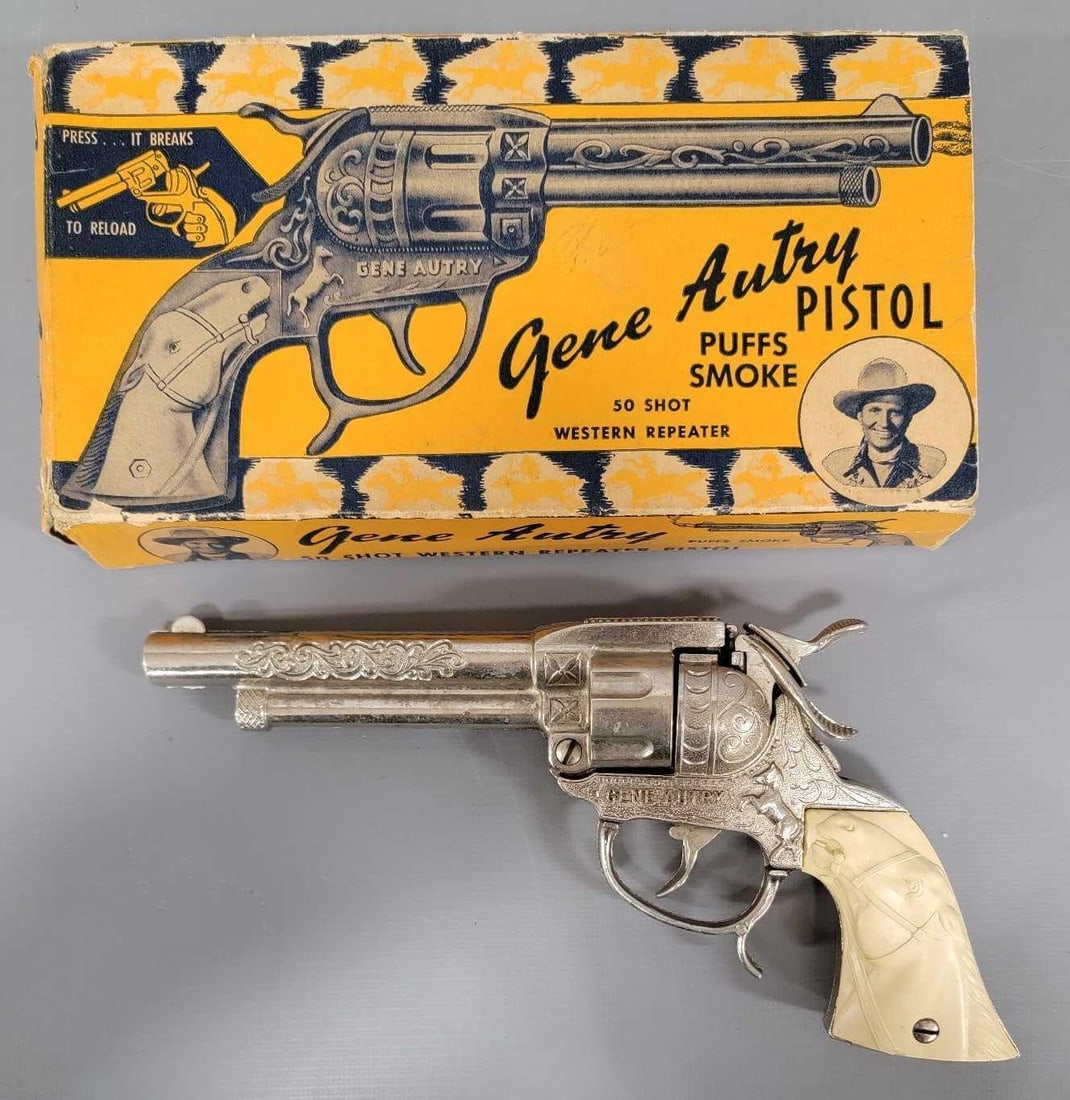 Mint Leslie Henry Gene Autry 50 shot western repeater cap pistol in original box 75: Mint Leslie Henry Gene Autry 50 shot western repeater cap pistol in original box, stock number 75. The cap gun is unused and in near mint to mint condition and works perfectly. It comes in a fair to g