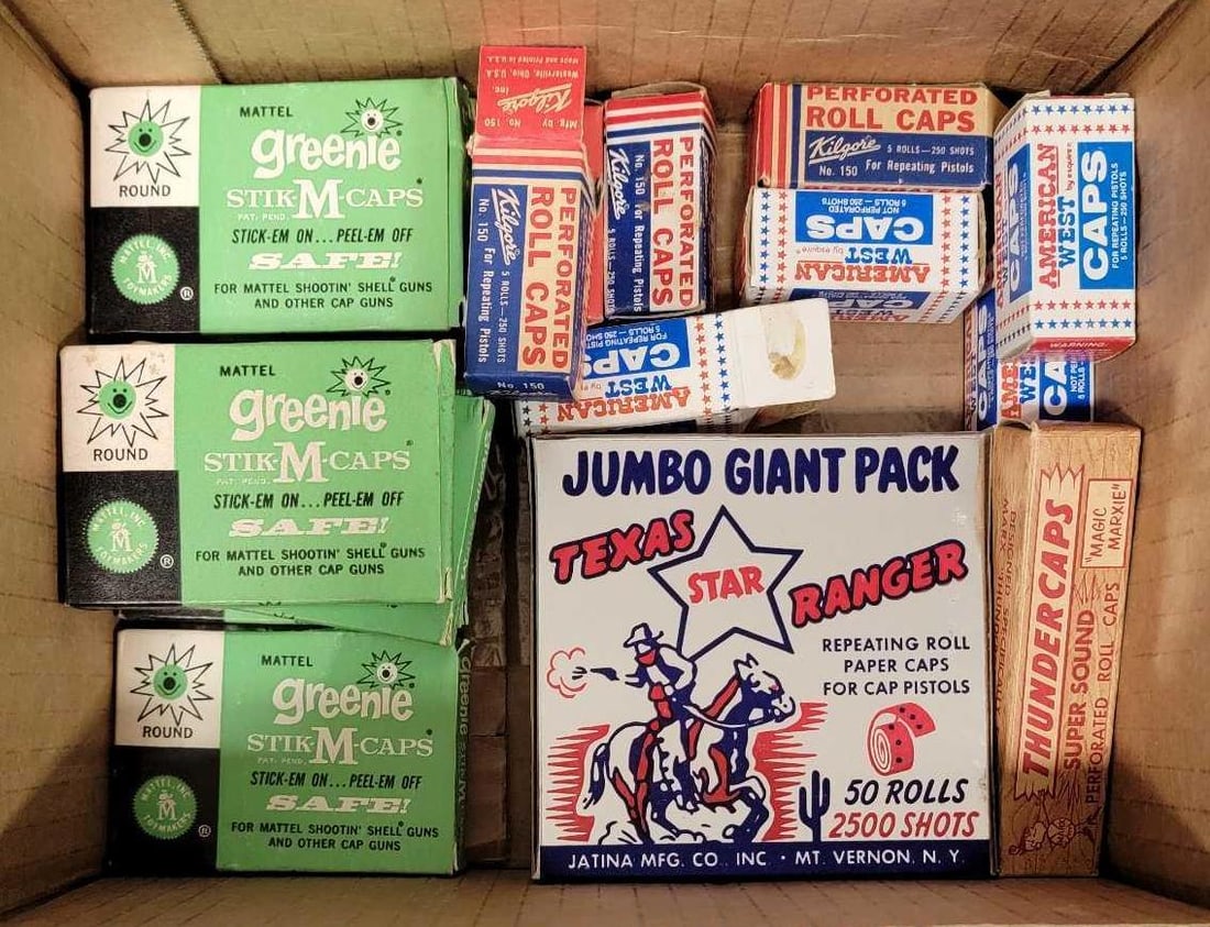 Great group of Mattel Greenie stik m caps and others: Great group of Mattel Greenie stik-m-caps, perforated roll caps and Texas ranger roll caps. There are 6 packs of Greenie, five unopened, two partial and one empty boxes of Kilgore and American roll ca
