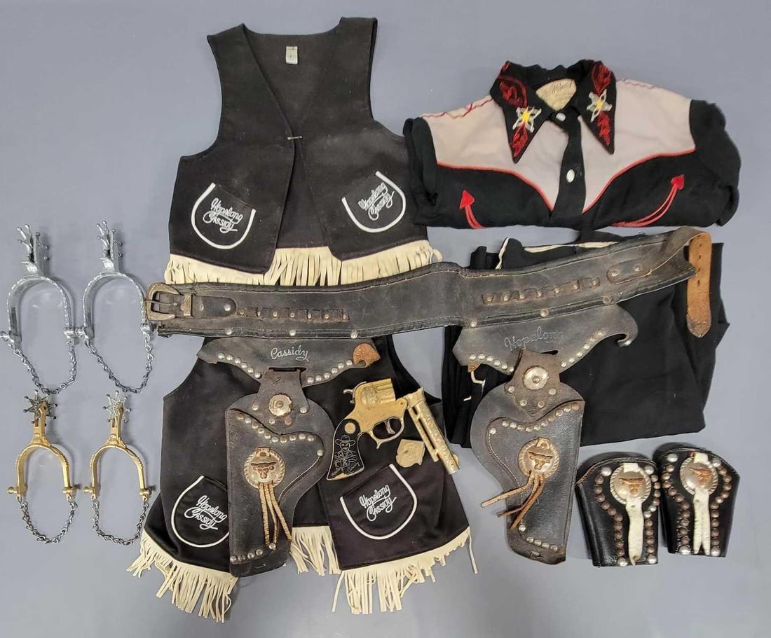 Group of vintage childs Hopalong Cassidy outfit clothes and dress up gear: Group of vintage childs Hopalong Cassidy outfit clothes and dress up gear to include shirts, pants, cuffs and belt with holsters in various condition as seen in the photos.