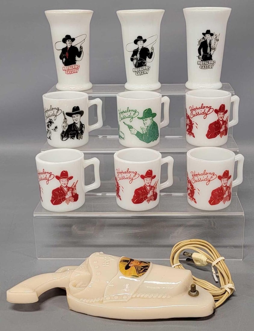 Nine Hopalong Cassidy Milk Glass mugs and cups plus night light: Nine Hopalong Cassidy Milk Glass mugs and cups plus night light to include two breakfast milk and one lunch milk glasses, and six mugs plus a very nice looking sconce night light that will need to be 