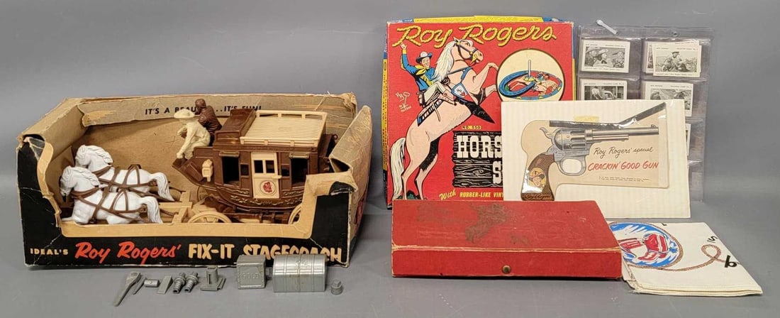 Group of vintage Roy Rogers items: Group of vintage Roy Rogers items to include an Ideal Fix-it Stagecoach in nice shape with most accessories but the rear axle is broken off in one of the lugs in a rough original box, pencil box, pape