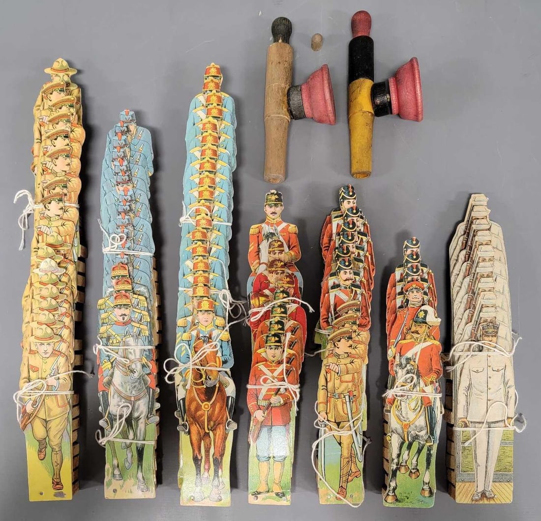 91 antique Parker Brothers game soldiers with two cannons: 92 antique Parker Brothers game soldiers with two cannons. These soldiers range from near mint condition down to fair with the majority of them being in higher grade with the lower grade examples havi
