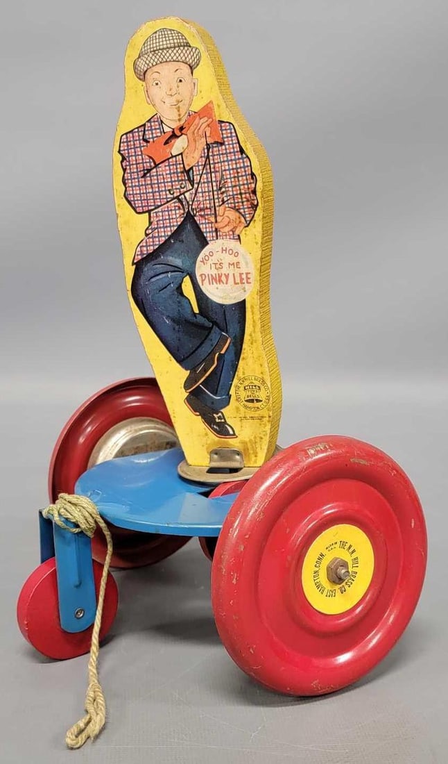 N. N. Hill Brass Co. Pinky Lee wood and pressed steel pull toy with bells: N. N. Hill Brass Co. Pinky Lee wood and pressed steel pull toy with bells in excellent condition, stands 10 1/4 inches tall and 6 3/4 inches wide as seen in the photos.