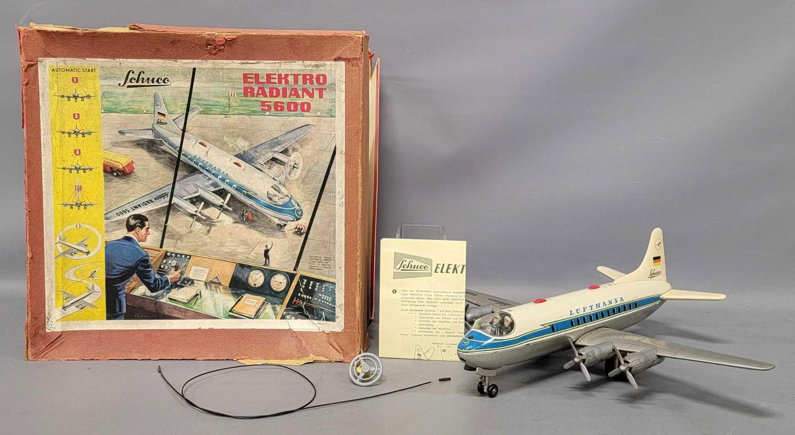 Schuco Elektro Radiant 5600 Lufthansa tin lithographed battery operated airplane in OB: Schuco Elektro Radiant 5600 Lufthansa tin lithographed battery operated airplane in original box. A great looking airplane that I did get to work for a short amount of time but it never did operate fu