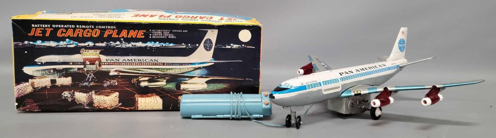Marx tin Japan battery operated Pan American jet cargo plane in original box: Marx tin Japan battery operated Pan American jet cargo plane in original box in excellent working condition in a very good original box as seen in the photos. Measures 18 inches long