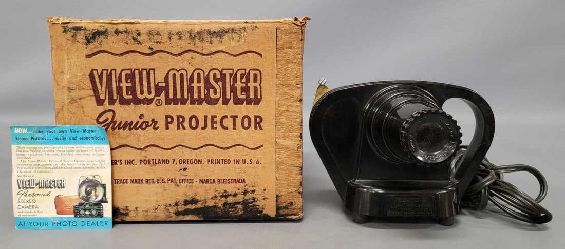 Sawyer's View-Master Junior projector in original box: Sawyers View-Master Junior projector in original box, tested and works nicely, not sure if the lamp is the proper wattage but it certainly gets warm but projects a nice image at about 15-20 feet dista