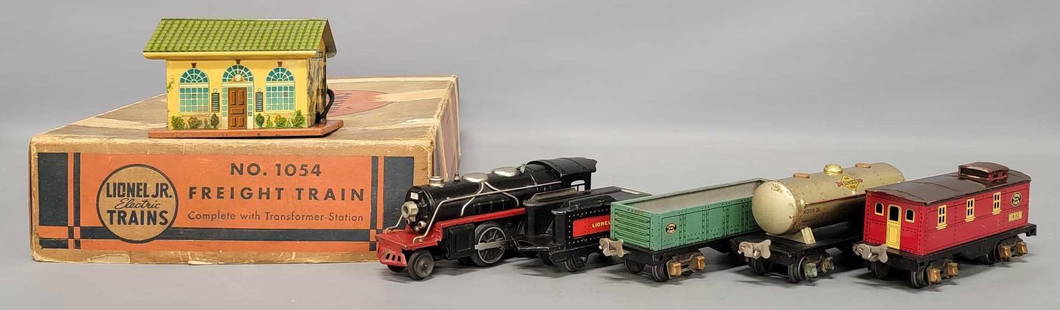 Lionel Jr. prewar O gauge 1054 freight set in original box: Lionel Jr. prewar O gauge 1054 freight set in original box. Set consists of 1681E steam locomotive, 1661T tender, 1677 gondola, 1680 tank car, 1682 caboose and tin station with a transformer inside, C