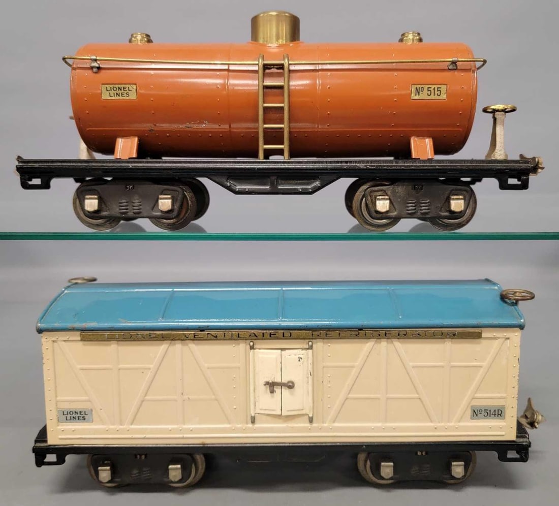 Lionel prewar standard gauge 514R reefer and 515 tank car: Lionel prewar standard gauge 514R cream reefer with dark blue roof and tan 515 tank car, C
