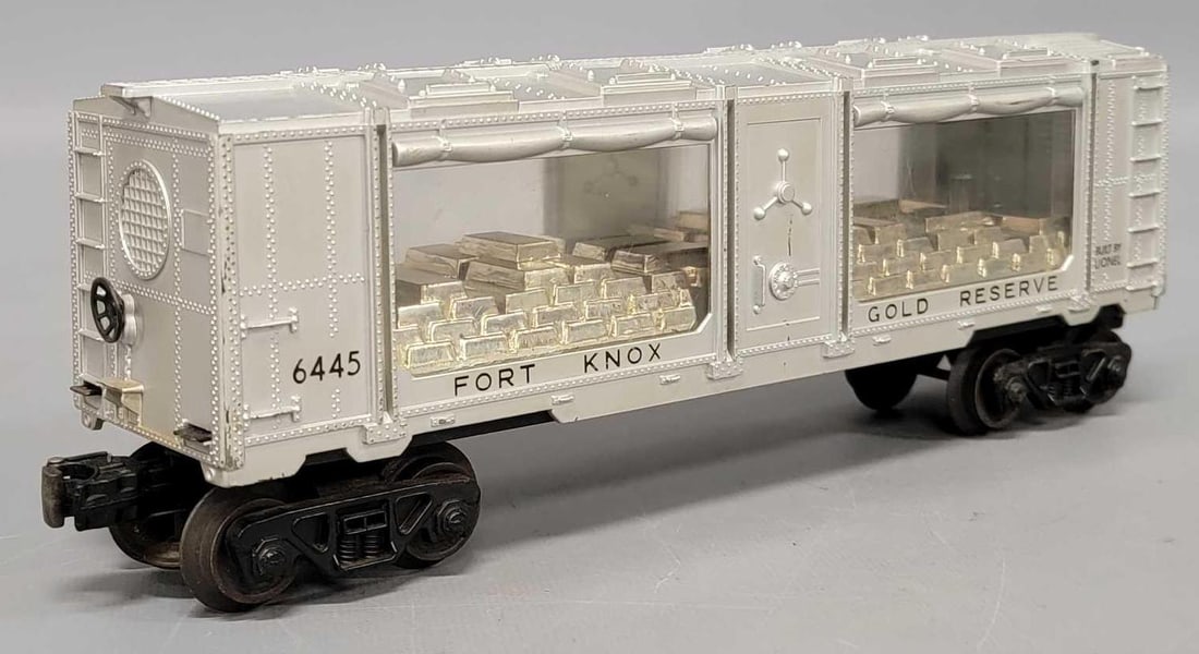 Lionel postwar O 6445 Fort Knox gold reserve car: Lionel postwar O 6445 Fort Knox gold reserve car, shows very light run time and is C7 as seen in the photos.