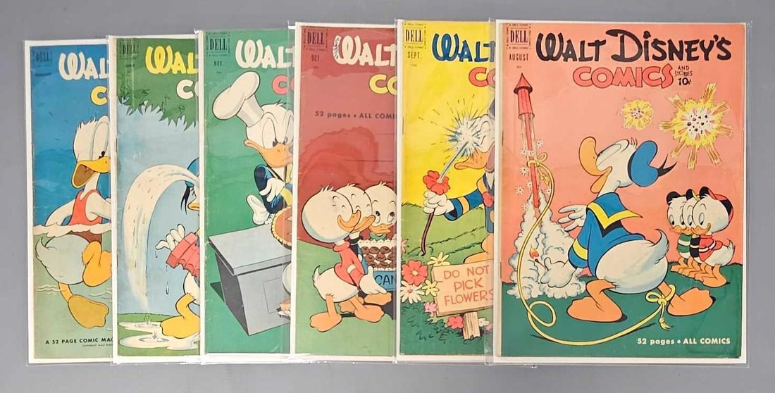 Six Disney Comics and Stories: Comics and Stories 131 light wear, writing on back cover, 132 mid grade, 133 mid grade, 134 crease bottom right, moderate spine wear, 1st Beagle Boys, 141 low grade, 143 mid grade as seen in the photo