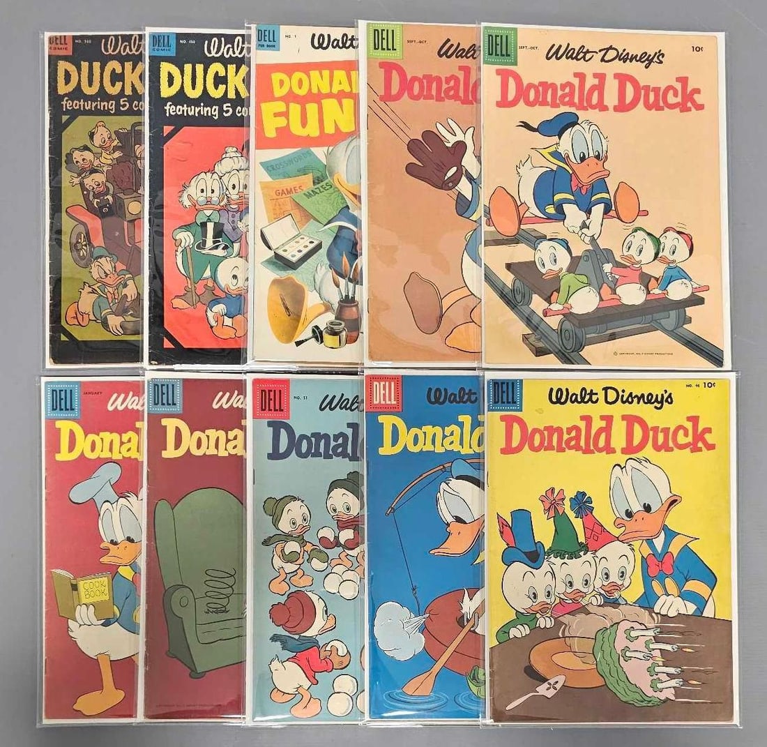 Ten Walt Disney's Donald Duck: Donald Duck 46, 51, 67 are mid grade, 47, 57, 61 are high grade, 52 is low grade, Fun Book 1 is mid grade with most puzzles filled in with ink. Duck Album 450, 560 low grade as seen in the photos.