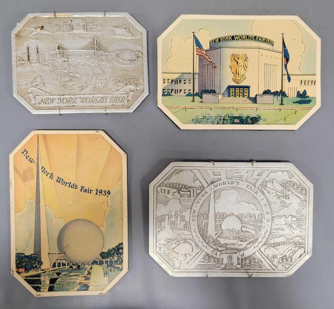 Four New York Worlds Fair Trivets: Two New York Worlds Fair silver trivets and two New York Worlds Fair trivets with color images in very good to excellent condition as seen in the photos.