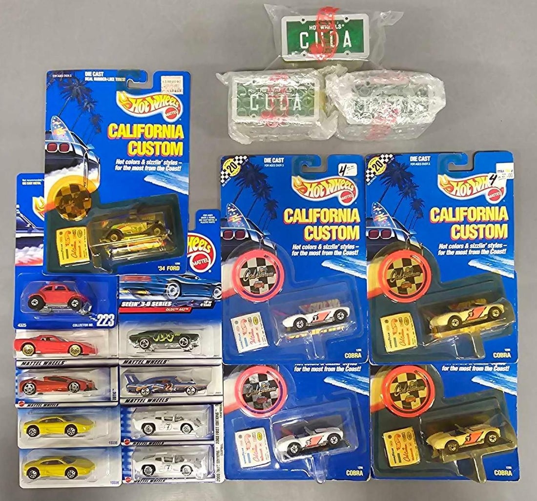 Group of seventeen Hot Wheels on sealed blister cards: Group of seventeen Hot Wheels on sealed blister cards to include five California Customs, eight main lines, three Parking Plates and one blue card, all cars are in near mint to mint condition on very 