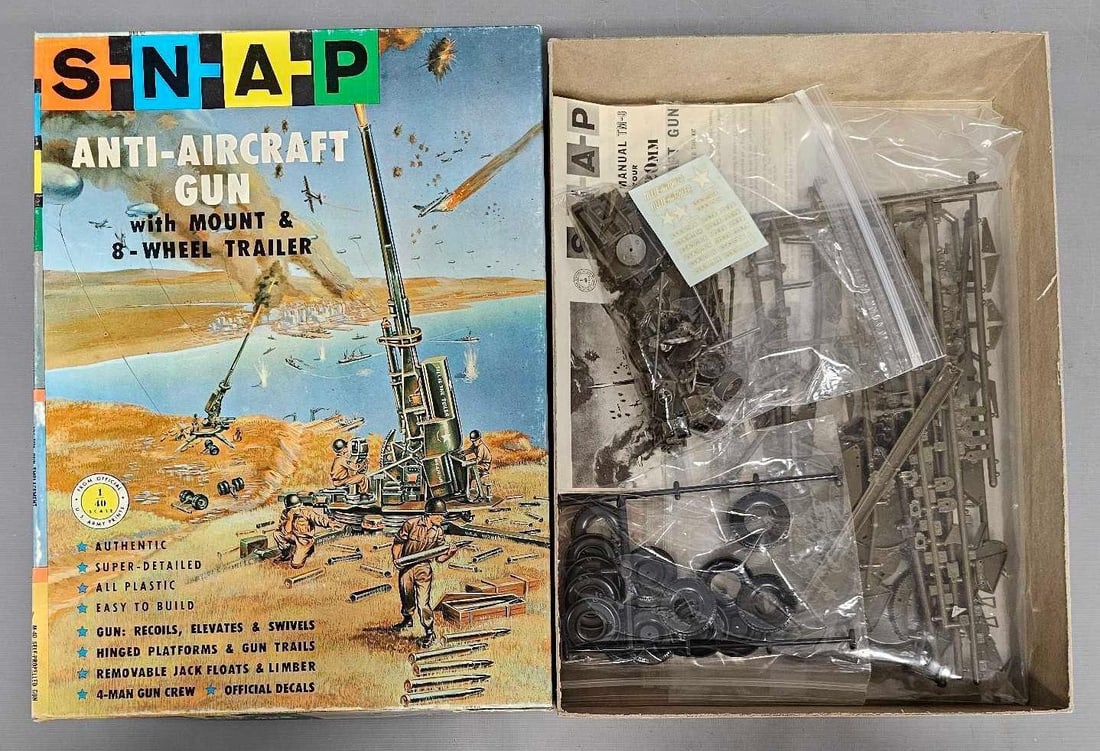 SNAP 1:40 Anti-Aircraft Gun kit 156: SNAP 1:40 Anti-Aircraft Gun kit stock number 156 This is an open box, sealed bag kit with all parts accounted for and an original instruction sheet Mint unbuilt as seen in the photos.