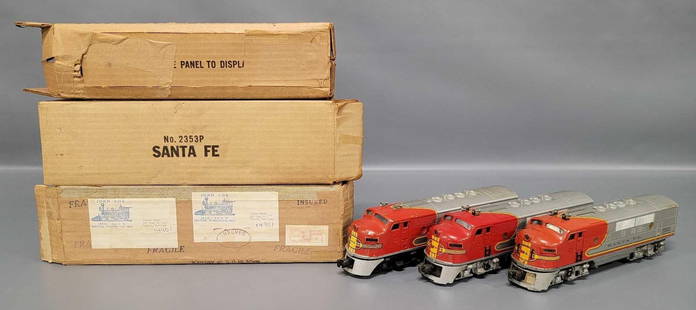 Three different Lionel postwar O Santa Fe F-3 A units with 3 non-matching original boxes: Three different Lionel postwar O Santa Fe F-3 A units with 3 non-matching original boxes. Includes powered 2343 and 2383 and non-powered 2353 unit with no battery damage, C6-7 area. The boxes include