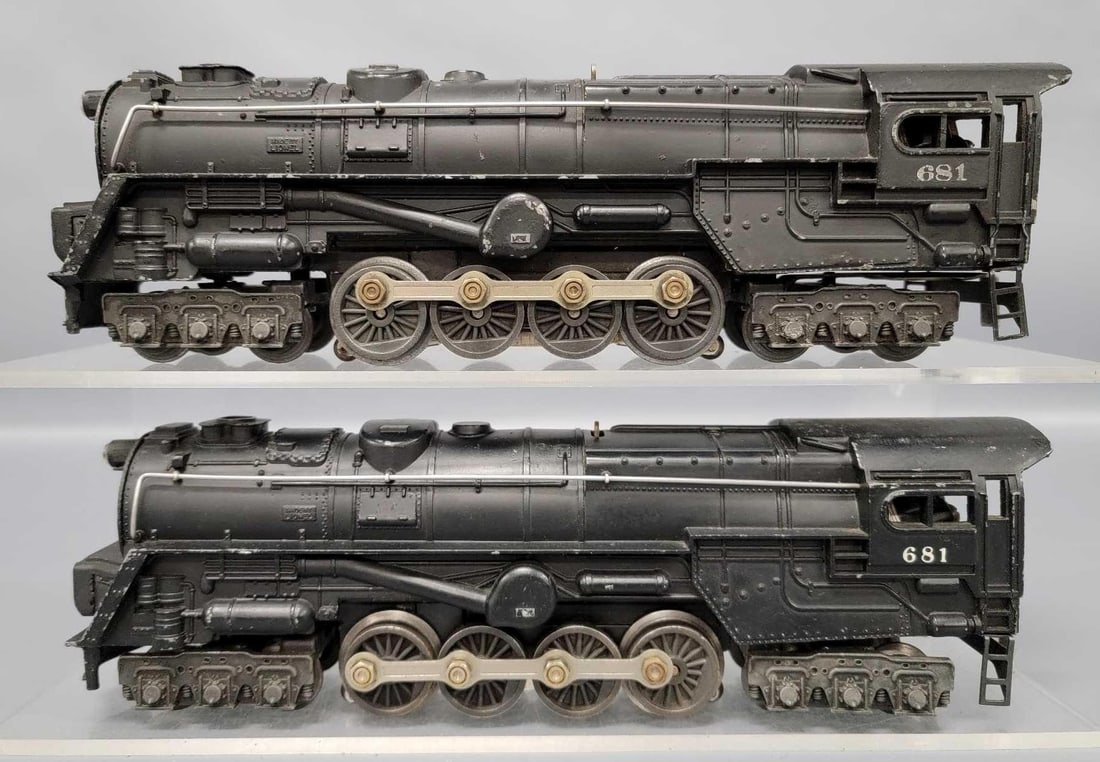 Two Lionel postwar O 681 steam turbine locomotives: Two Lionel postwar O 681 steam turbine locomotives, one with rubber stamped lettering and one with heat stamped lettering, C6 as seen in the photos.