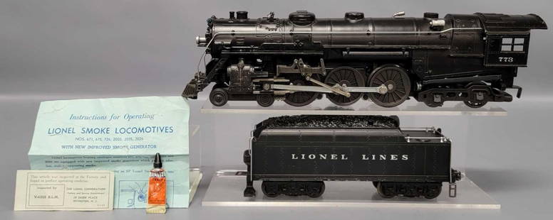 Lionel postwar O 1950 773 steam locomotive with 2426W tender: Lionel postwar O 1950 773 steam locomotive with 2426W tender, both units show moderate to heavy run time and are C7 as seen in the photos with reproduction boxes.