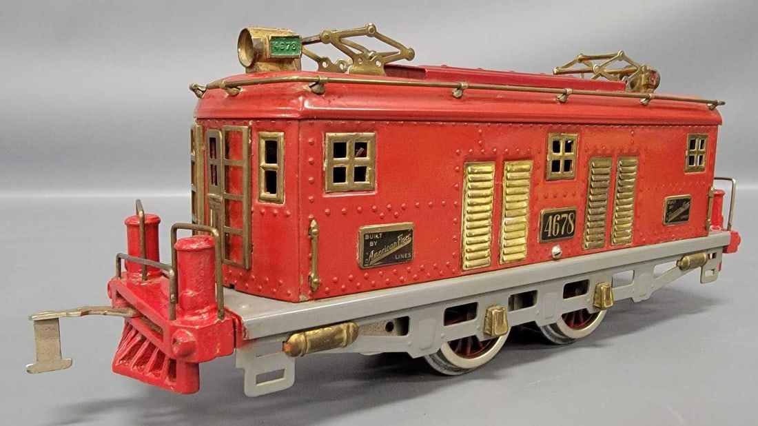 American Flyer wide gauge 4678 electric locomotive: American Flyer wide gauge red 4678 electric locomotive, C7 body BUT the pilots and frame have been repainted with MEW drivers as seen in the photos.