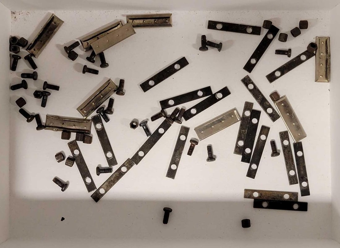 Group of Lionel prewar O scale T Rail hardware: Group of Lionel prewar O scale T Rail hardware to include fish plates, nuts and bolts as seen in the photos.