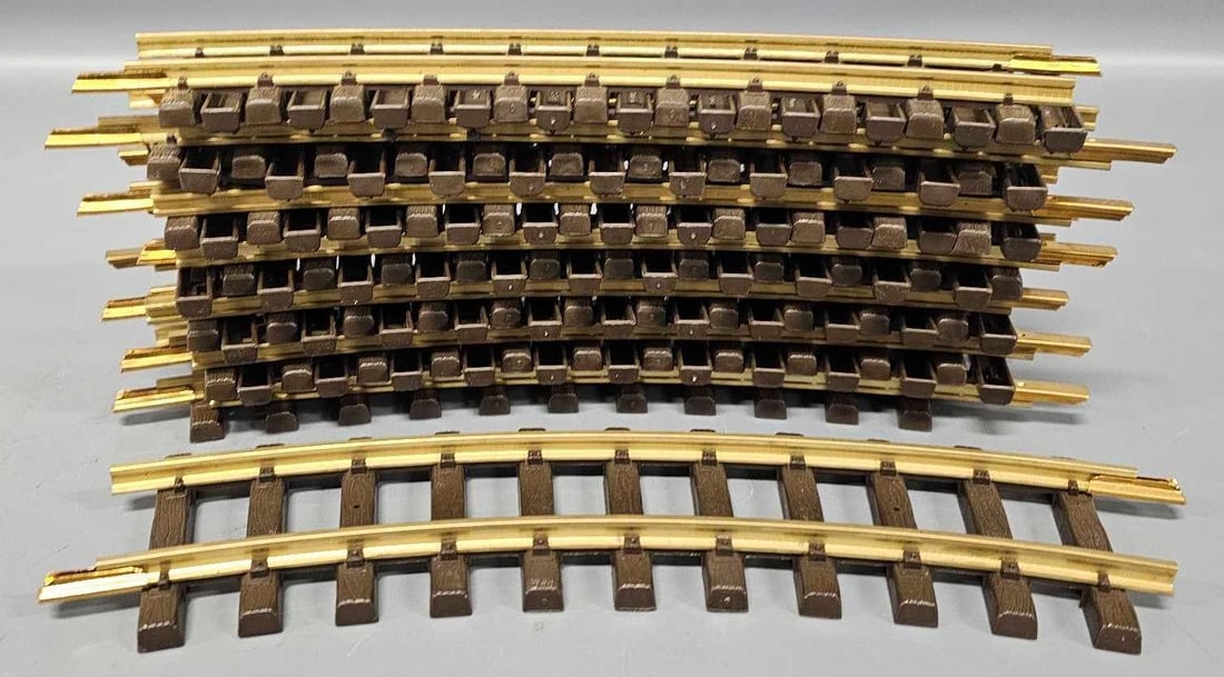 Fourteen sections of LGB G gauge 11 3/4 inch curved track 1101: Fifteen sections of LGB G gauge 1100, 11 3/4 inch curved track, used but in very good to excellent condition with no rust or pitting as seen in the photos.