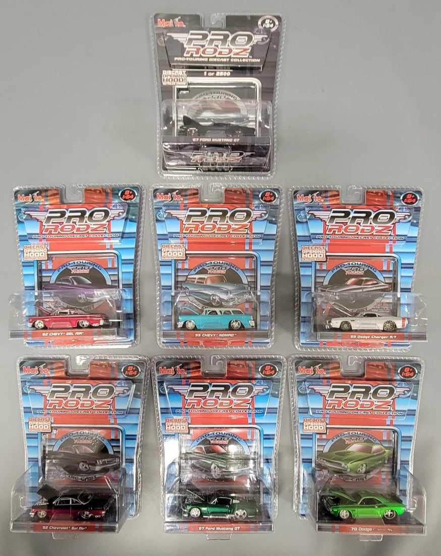 Seven Maisto Pro Rodz in original blister packs: Seven Maisto Pro Rodz in original blister packs. 1969 Dodge Charger R/T, 1967 Ford Mustang GT, 1955 Chevy Nomad, 1962 Chevy Bel Air, 1970 Dodge Challenger R/T, 1962 chevy Bel Air, 1967 Ford Mustang GT