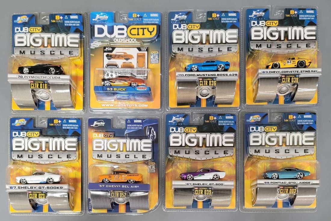 Eight Jada Dub City Bigtime Muscle cars in original blister packs (1 of 5)