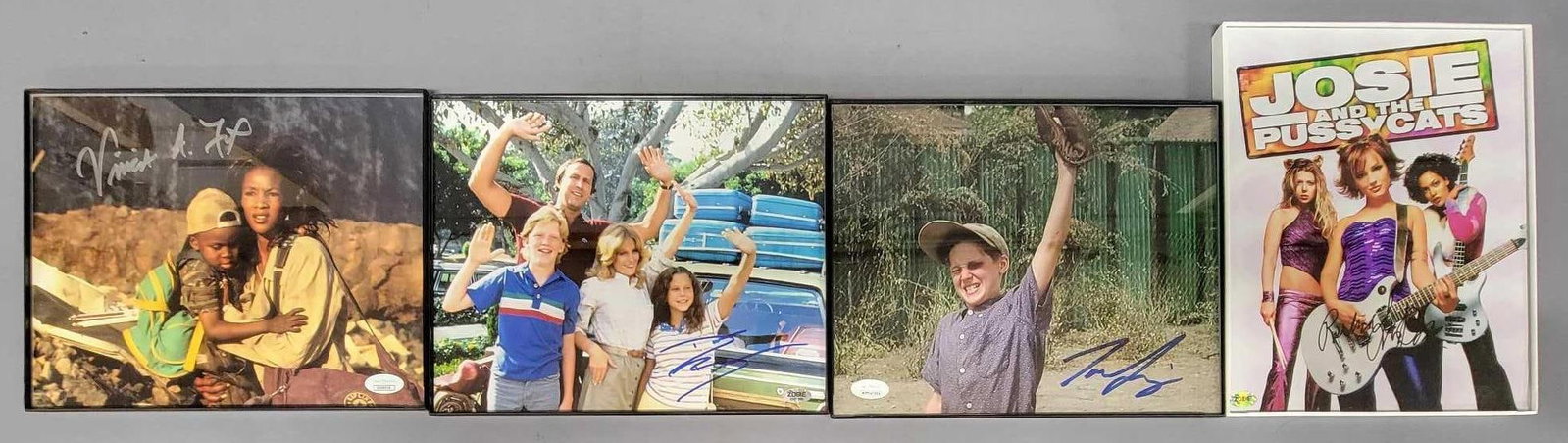 Four framed and autographed photos from Josie and the Pussycats Sandlot Vacation Independence Day: Four framed and autographed photos from Josie and the Pussycats Sandlot Vacation Independence Day. Josie and the Pussycats signed by Rachel Leigh Cook, in near mint condition as seen in the photos.