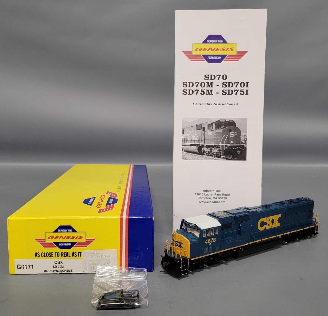 Athearn Genesis HO CSX SD-70M diesel locomotive in OB: Athearn Genesis HO CSX SD-70M YN3 scheme 6-6 diesel locomotive cab number 4678 stock number G6171 C9-10 unrun with rails in factory sealed bags with all original paperwork has not been ran in an excel