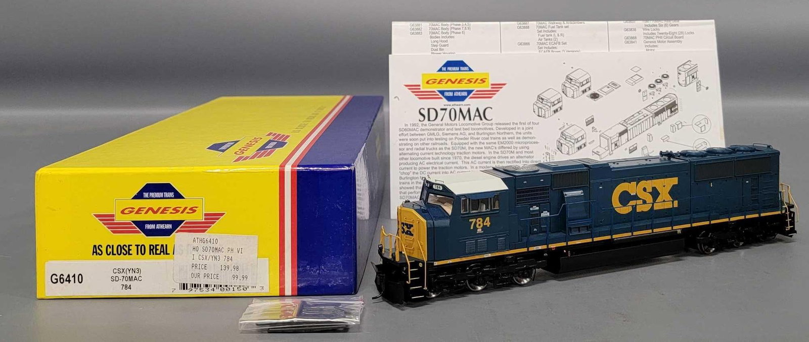 Athearn Genesis HO CSX SD-70MAC diesel locomotive in OB: Athearn Genesis HO CSX SD-70MAC 6-6 diesel locomotive cab number 784 stock number G6410 C9-10 unrun with rails in factory sealed bags and all original paperwork in an excellent original box as seen in