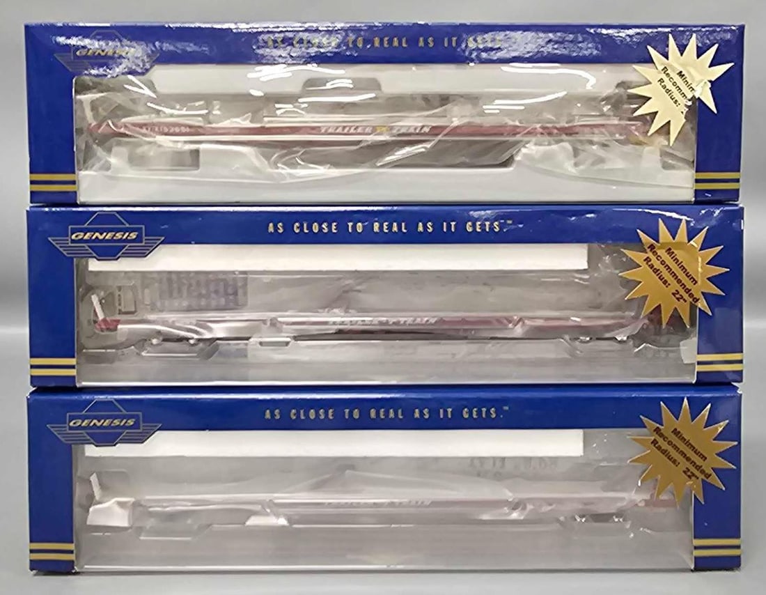 Three Genesis Trailer Train F89F flat cars in OB: Three Genesis Trailer Train F89F 89 foot flat cars C9/10 stock numbers G29569, ATHG29579, ATHG29580 C9/10 in very good original boxes as seen in the photos.
