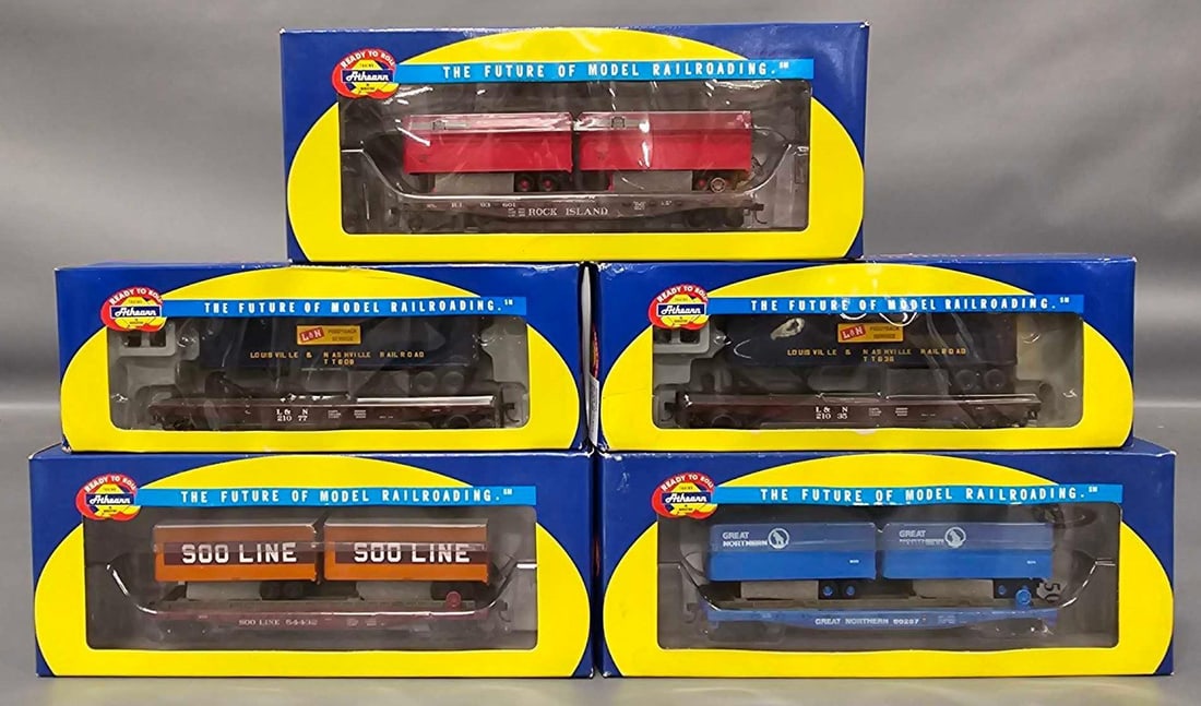 Five Athearn HO flat cars with trailers in OB (1 of 5)