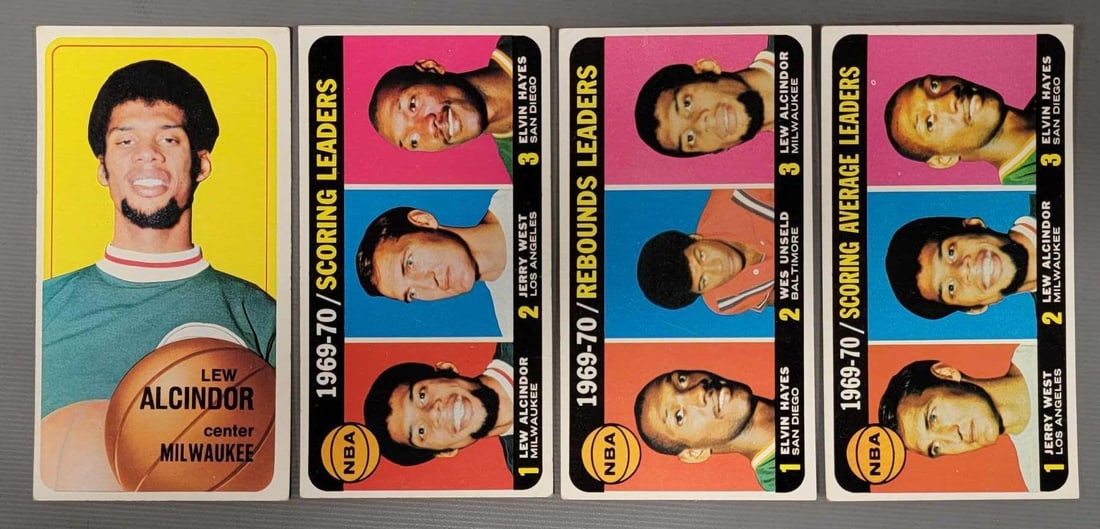 Four 1970-71 Topps Lew Alcindor Kareem Abdul-Jabbar basketball cards: Four 1970-71 Topps Lew Alcindor Kareem Abdul-Jabbar basketball cards to include card numbers 1 scoring leaders, 2 scoring average leaders, 5 rebounds leaders and 75, all in good to excellent condition