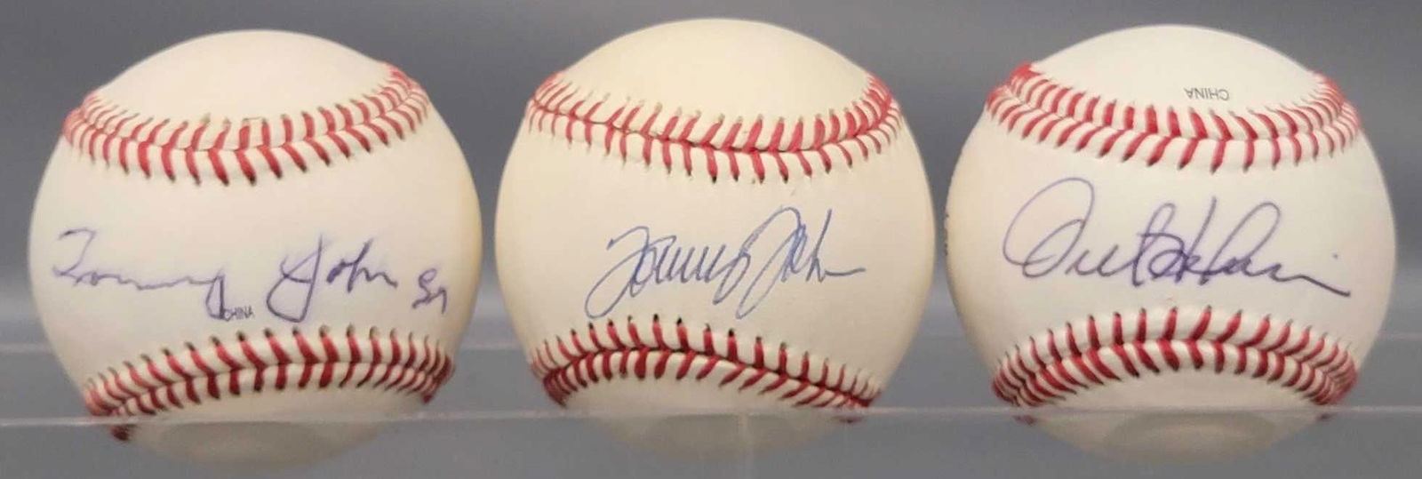 Tommy John and Orel Hershiser autographed baseballs (1 of 9)