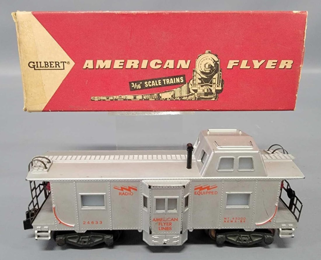 American Flyer S gauge 24633 bay window caboose in original box: American Flyer S gauge 24633 bay window caboose, shows light run time and is C6 due to a missing the knuckle coupler from one end as seen in the photos.