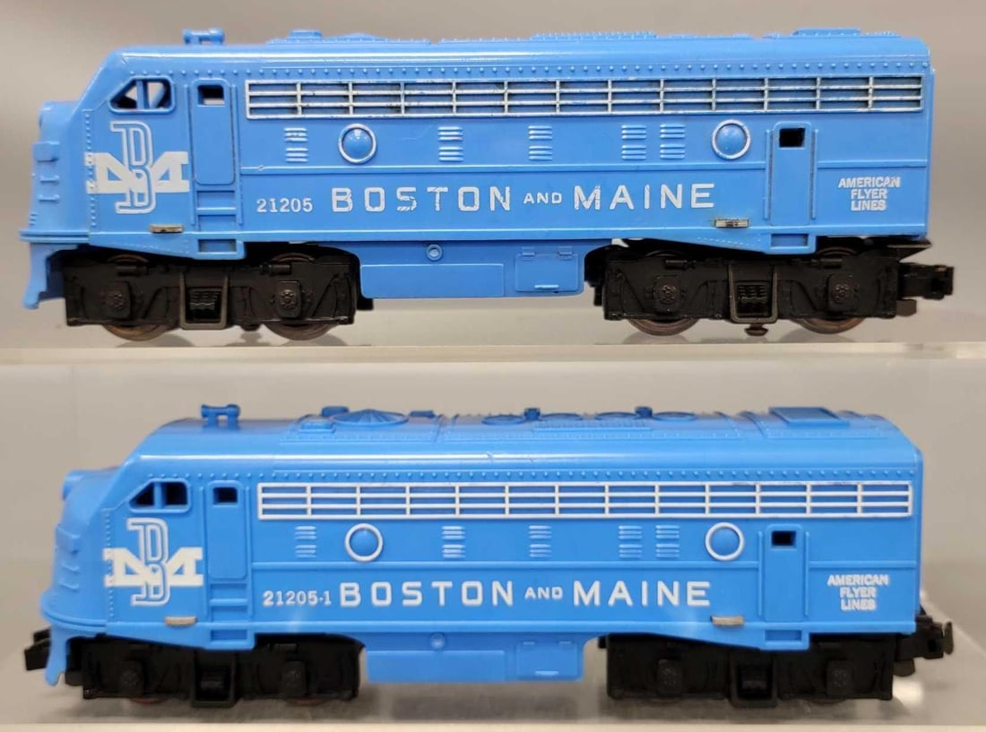 American Flyer S gauge 21205 21205-1 Boston and Maine F9 diesel locomotives: American Flyer S gauge 21205 21205-1 Boston and Maine F9 diesel locomotives, units show moderate run time and are C7 as seen in the photos. The 21205-1 is missing the headlight foil sticker.
