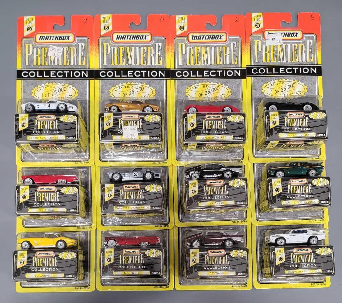 Group of Matchbox Premiere Collection cars in blister packs (1 of 4)