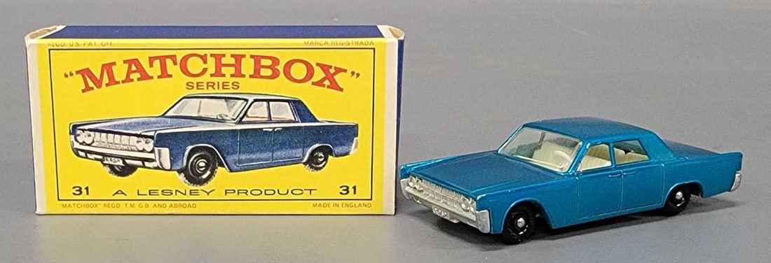 Superb Matchbox 31 Lincoln Continental in original box: Superb Matchbox 31 Lincoln Continental with black plastic wheels, in near mint to mint condition in an excellent E3 original box as seen in the photos.