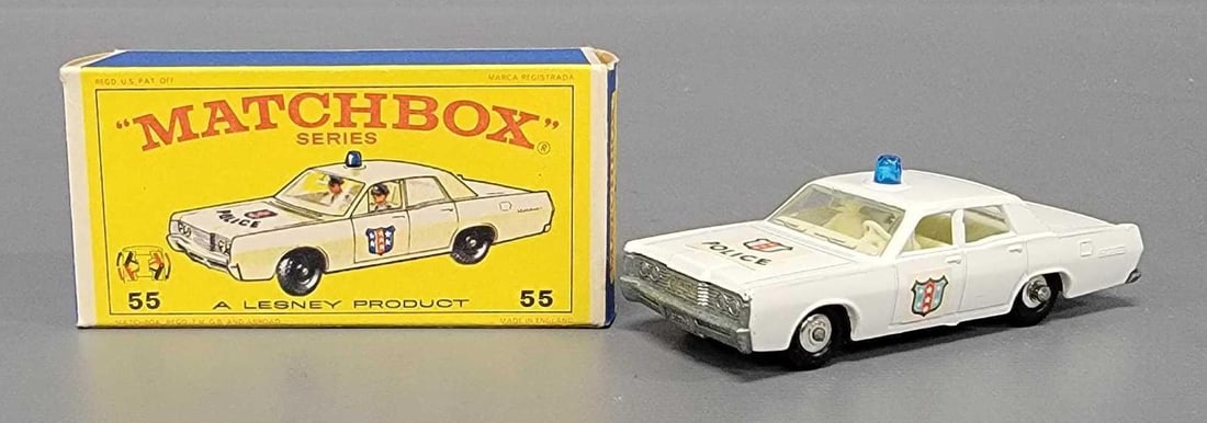 Matchbox 55 Police Patrol Car in original box: Matchbox 55 Police Patrol Car with black plastic wheels, front suspension, silver hubs in near mint condition in an excellent D2 original box as seen in the photos.